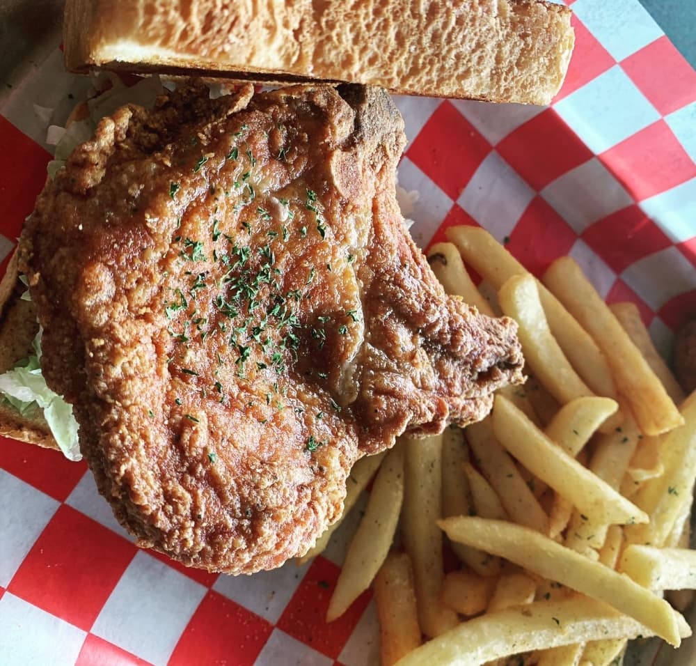 Pork chop basket ($13.99): Pork chops, fries and hushpuppies comprise this dish. (Courtesy Kid Kreole Kooking)