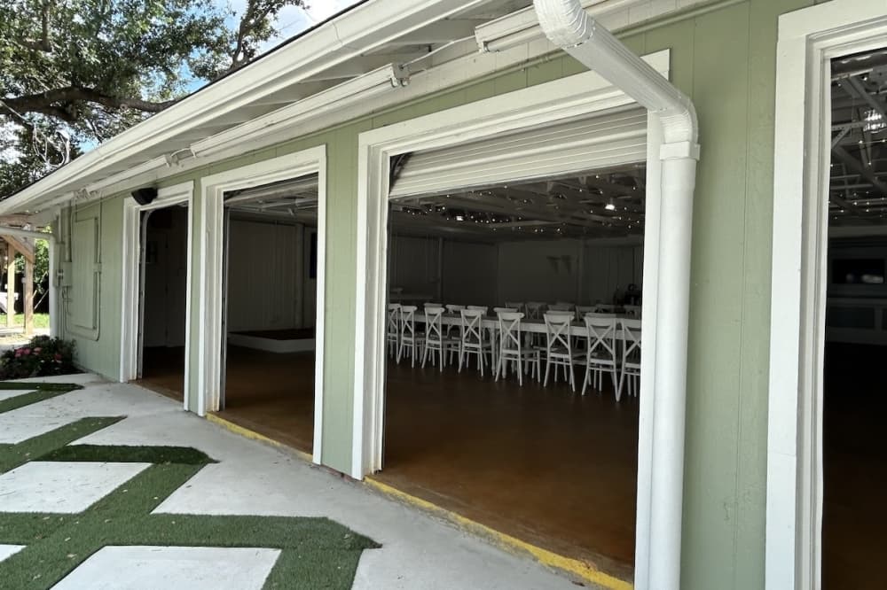 Rose Haven patio with garage doors open