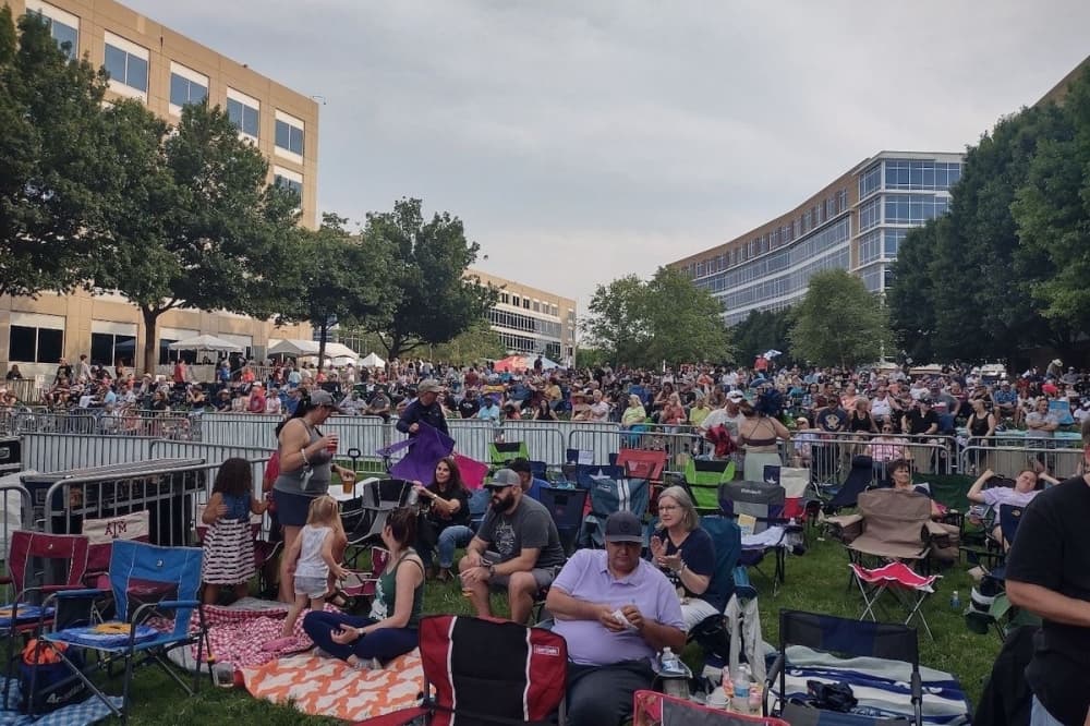 Residents sitting in front of the Methodist Richardson stage