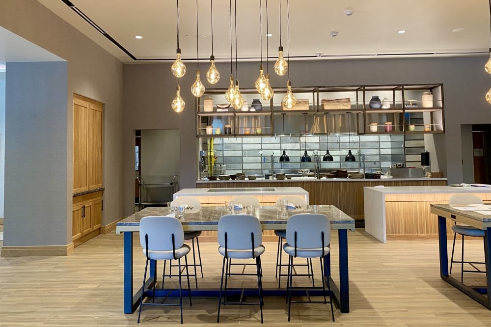 Conroux, is the on-site restaurant with indoor and outdoor seating in Hyatt Regency Conroe.