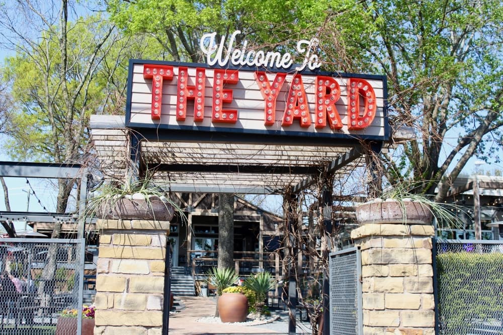The Yard sign over the entrance walkway