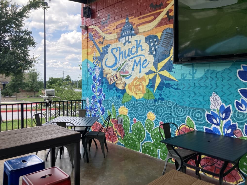 outdoor seating area with television 