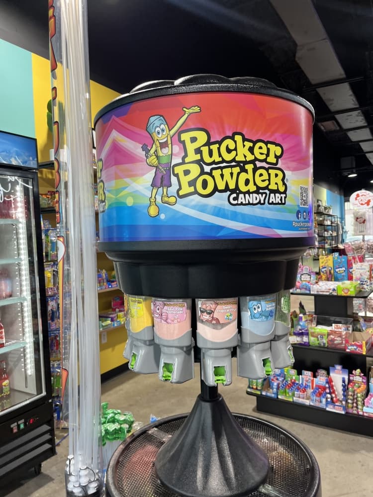 The Pucker Powder ($2.99-$9.99) is flavored sugar that can be mixed in a tube. (Peyton MacKenzie/Community Impact)