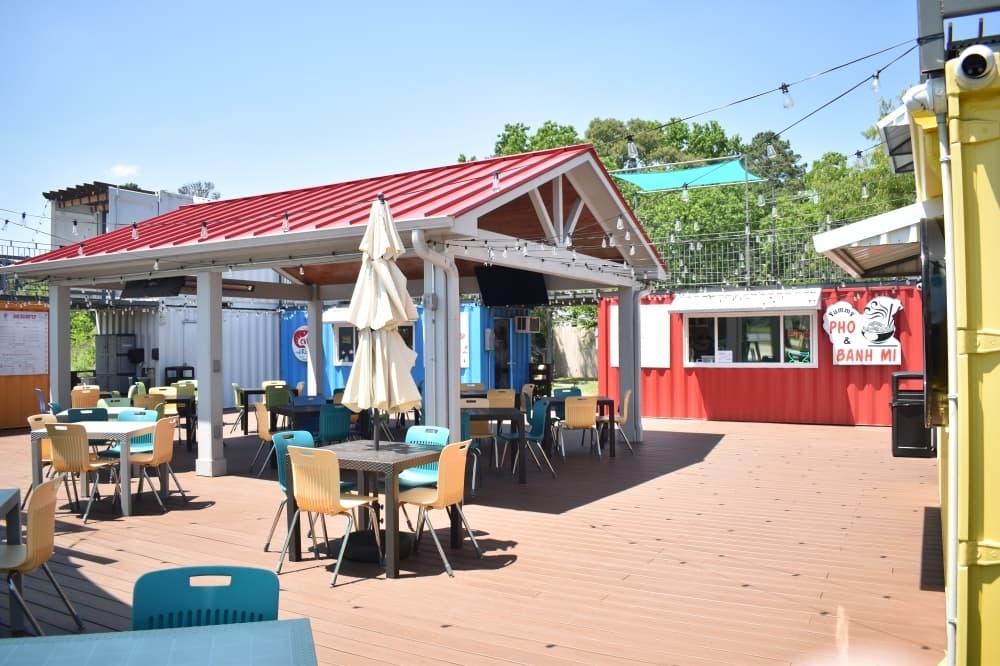 
Made with Conex shipping containers, The Deck features several food concepts and a large outdoor seating area.