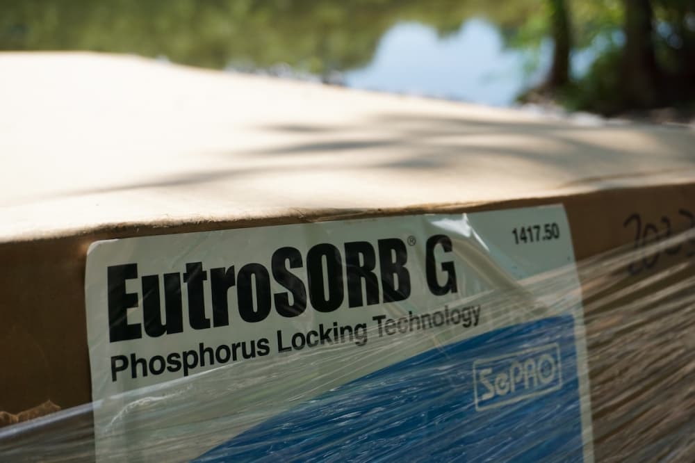 box with a sticker that says EutroSORB G Phosphorus Locking Technology
