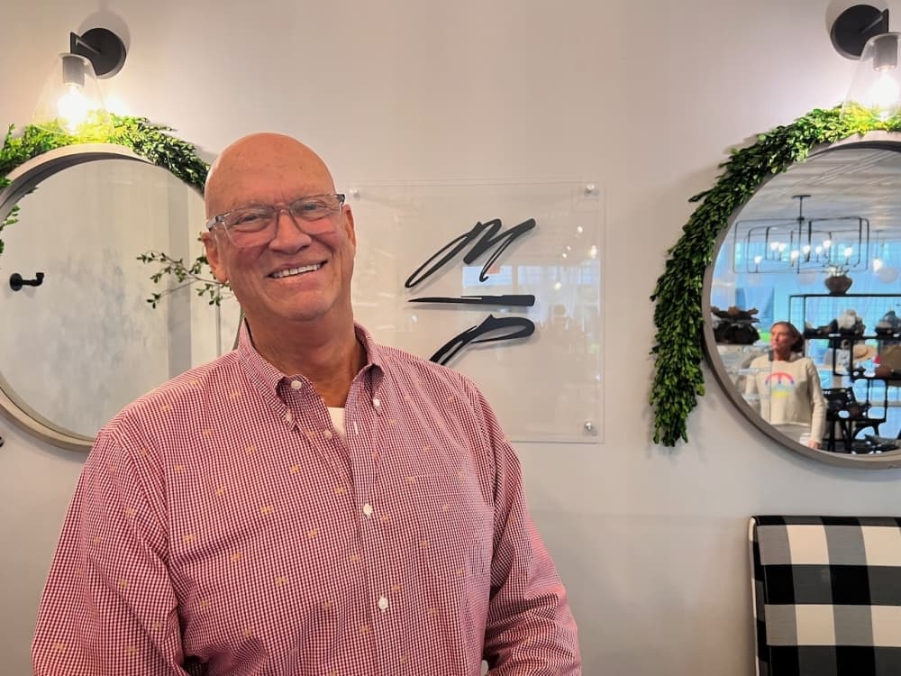 photo of owner in front mirror