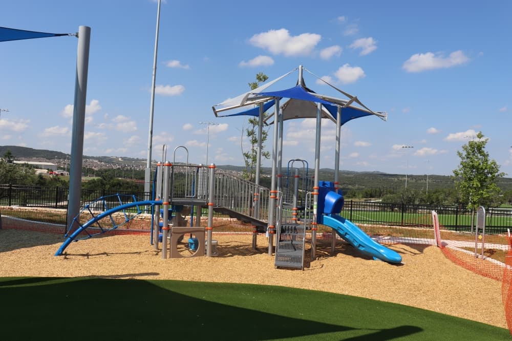 The complex has a playground for children. (Zara Flores/Community Impact)