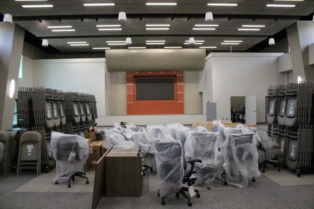 The photo shows the community hall in the George H.W. Bush Community Center