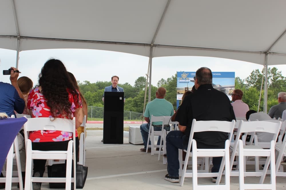 Superintendent Heath Morrison addresses attendees at the June 14 groundbreaking of Creekside Elementary School, located behind Lake Creek High School. (Anna Lotz/Community Impact)