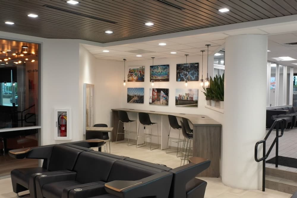 This is a photo of the inside of a renovated car dealership.