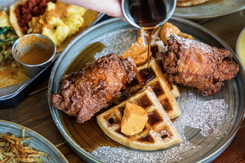 This is a photo of Dandelion Cafe's chicken and waffles dish.