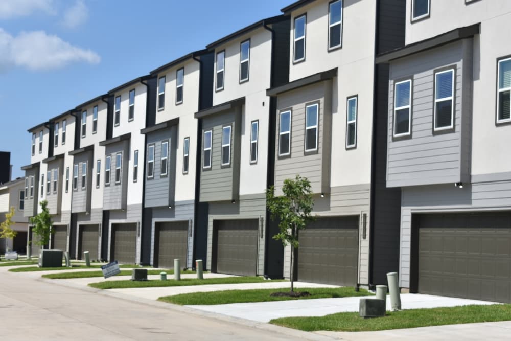 A row of identical homes in a rental community.