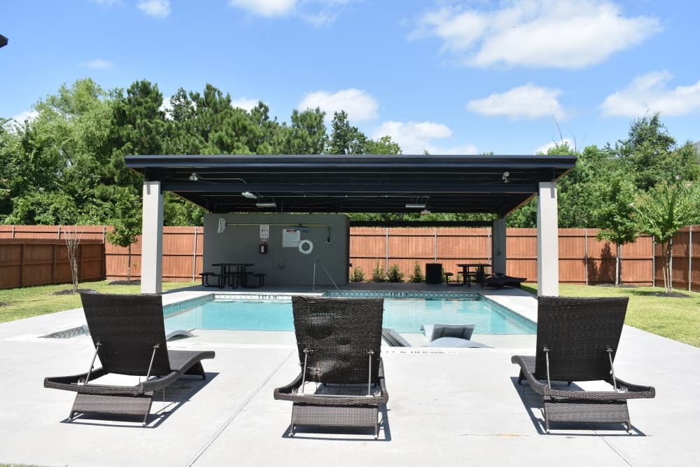 The swimming pool for the community includes gated entry. (Vanessa Holt/Community Impact)