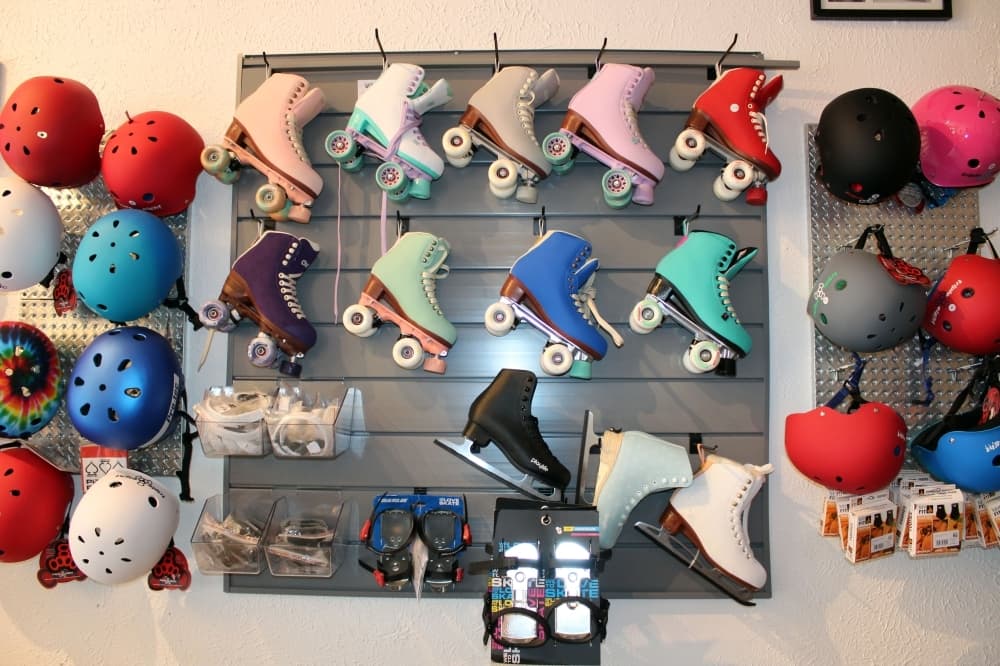 wall of skates and helmets