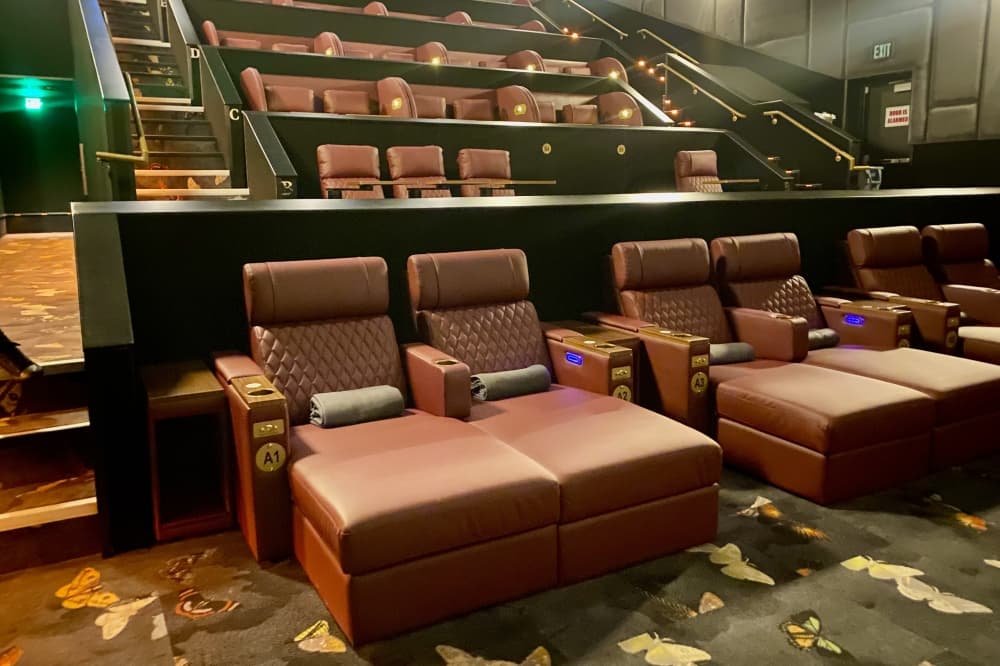 The Reel Luxury Cinema theatre includes luxury recliners including loveseat-style chaise lounges. (Cassandra Jenkins/Community Impact)