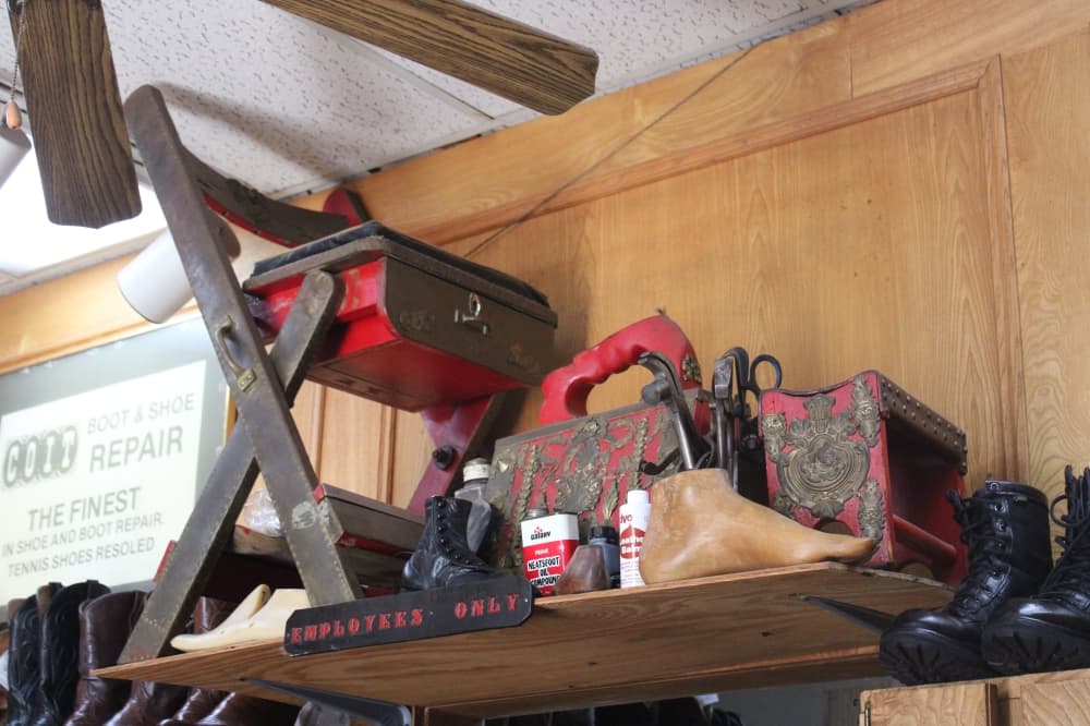 Shoeshine chair and tools.