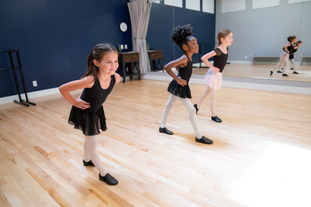 three kids dancing