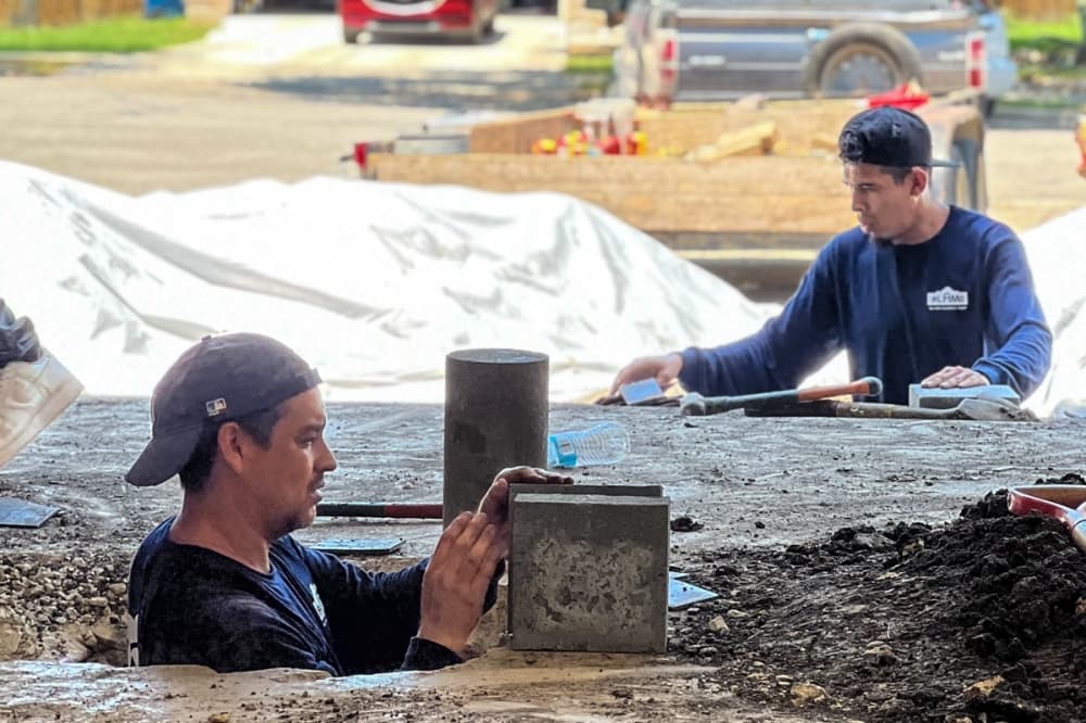 Foundation repair workers