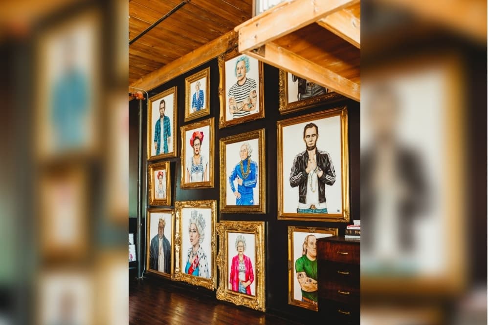 Gallery wall of pop art portrait paintings
