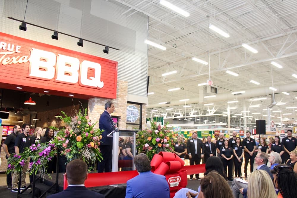 McKinney Top Store Leader Matt LoBello speaking at the H-E-B ribbon cutting event