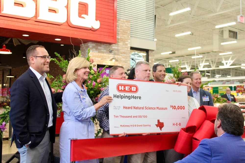 H-E-B leaders gifting Heard Museum representatives with a $10,000 huge check