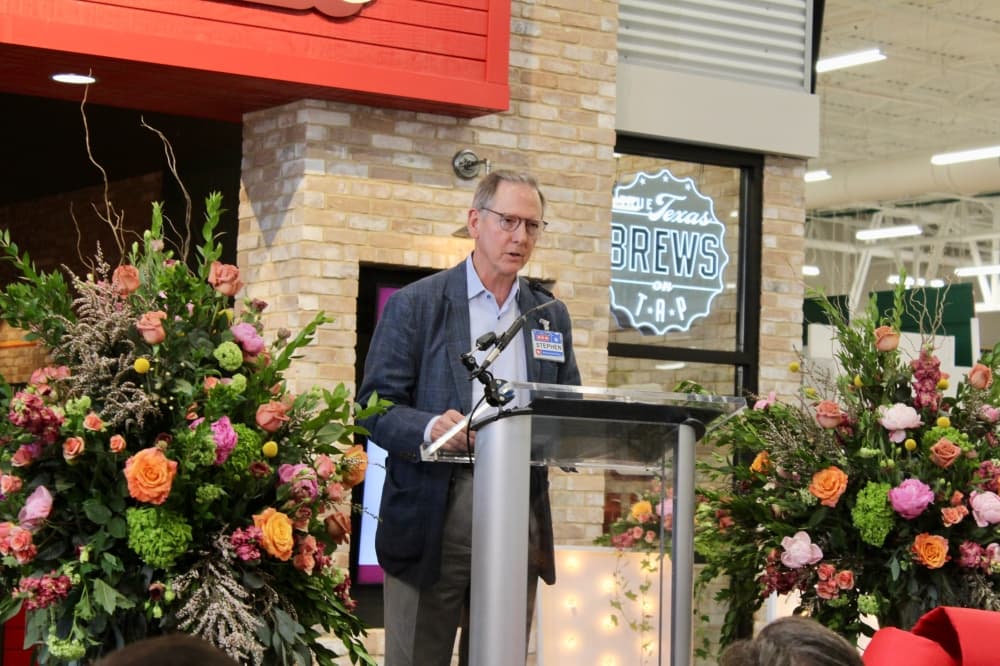 President of Central Market and H-E-B Stephen Butt speaking at the H-E-B ribbon-cutting event