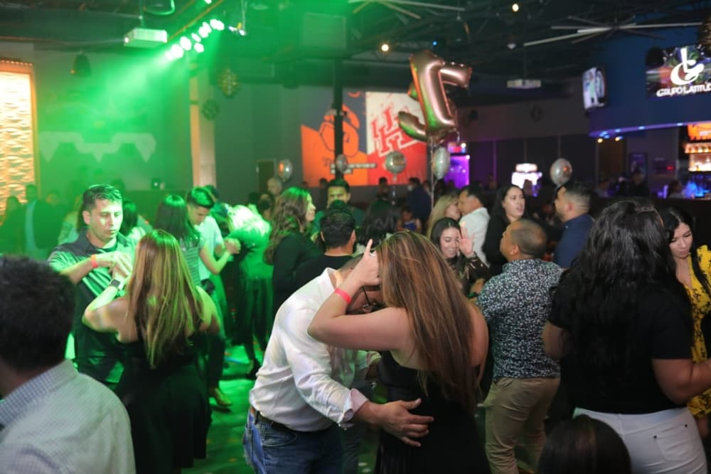 people dancing in a club