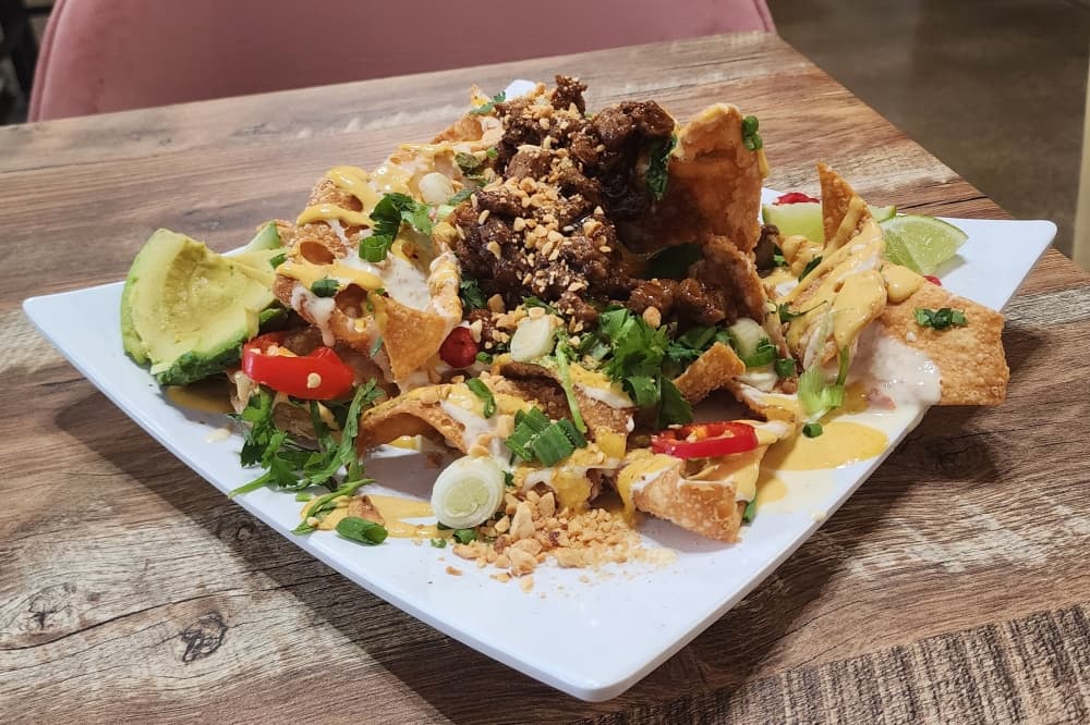 The Korean Wonton Nachos ($14) are one of the eatery’s most popular dishes. (Jarrett Whitener/Community Impact)