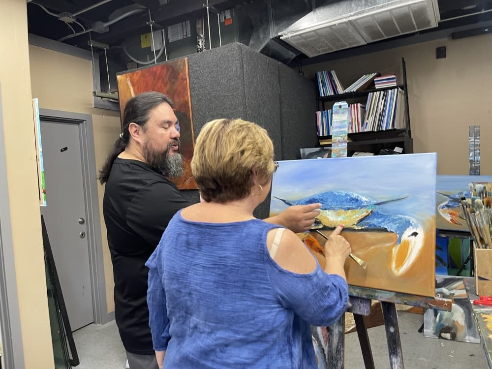 Jay Ybarra opened The Art Life in 2020 and offers a variety of lessons, including painting and guitar. (James T. Norman/Community Impact)