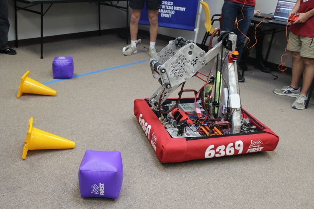 Robot built by students with cones and blocks