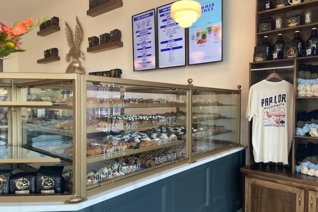 Doughtnut case and menu inside the shop