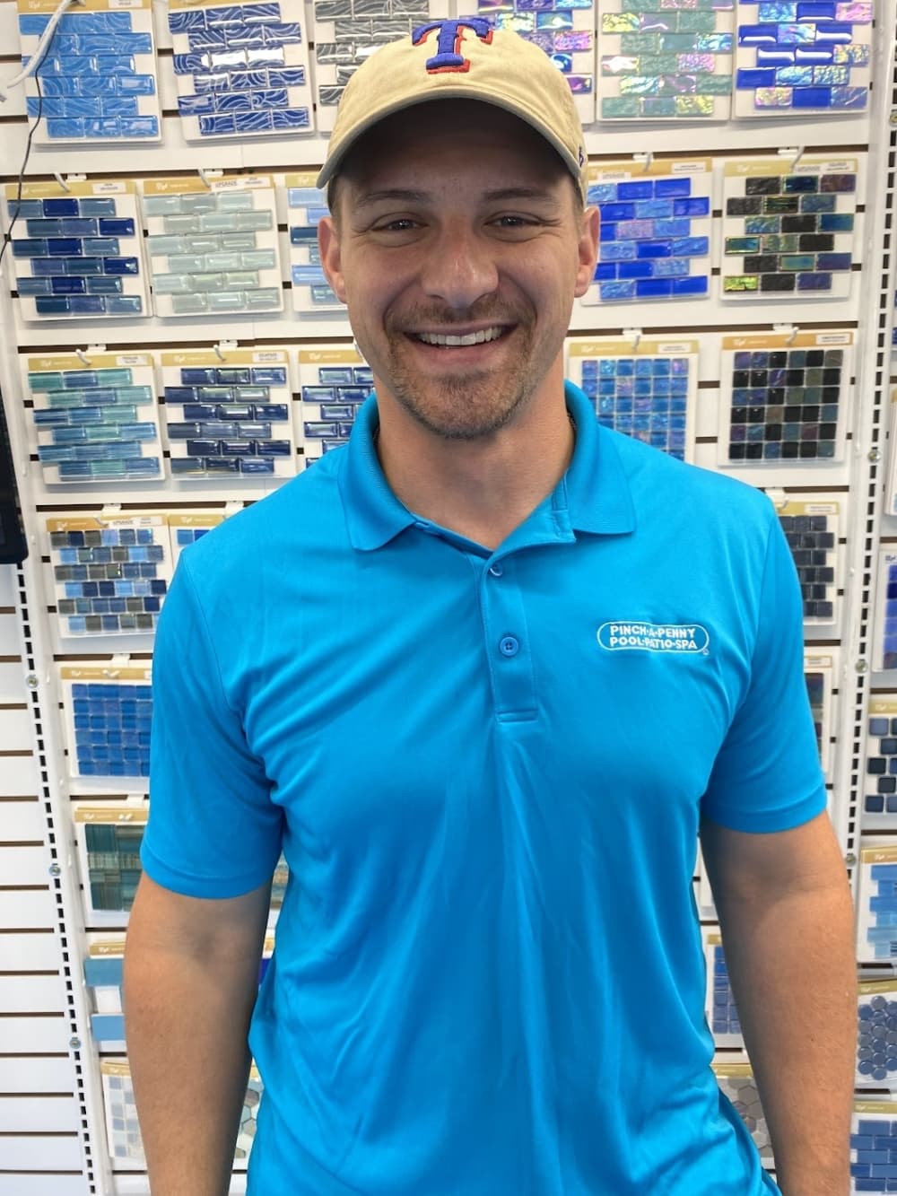 A headshot of John Parsons in a blue shirt