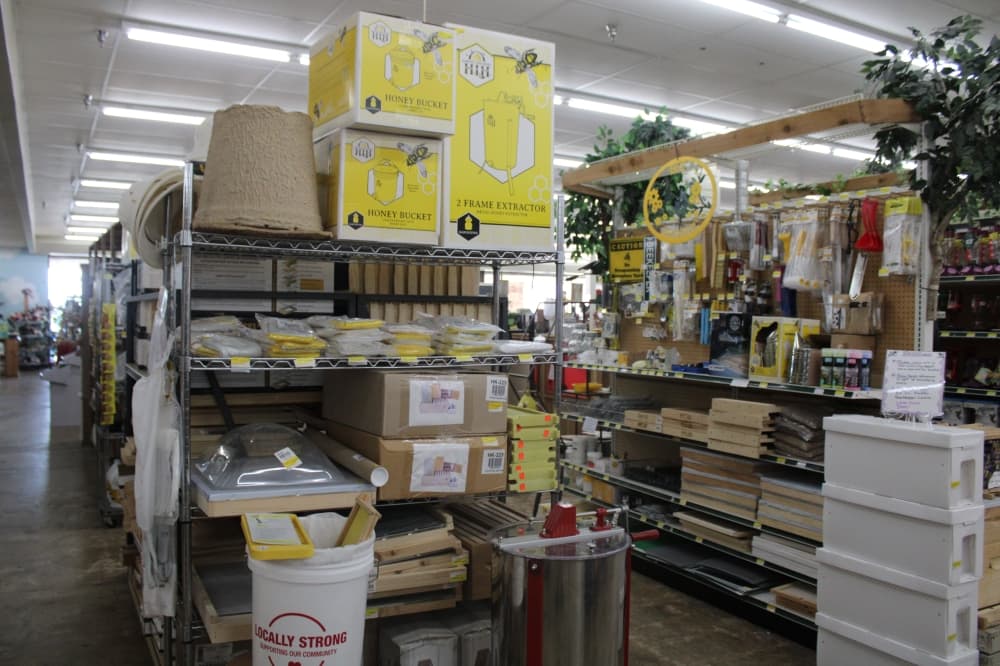 shelves with beekeeping equipment.