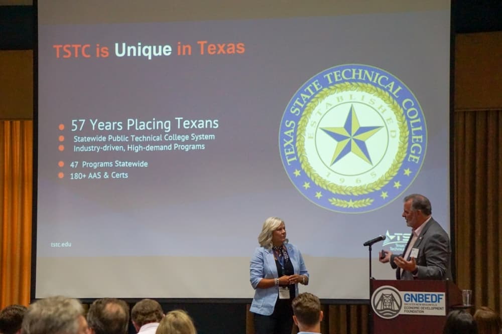Gail Lawrence, Texas State Technical College deputy chancellor, and Greg Lutz, Greater New Braunfels Economic Development Foundation executive director speak at event 