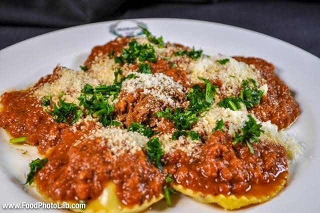Short Rib Stuffed Ravioli - Handmade ravioli stuffed with braised short rib and topped with bolognese and shaved parmesan. (Courtesy Marais)
