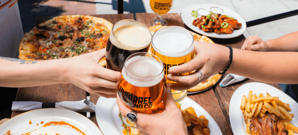hands holding beers