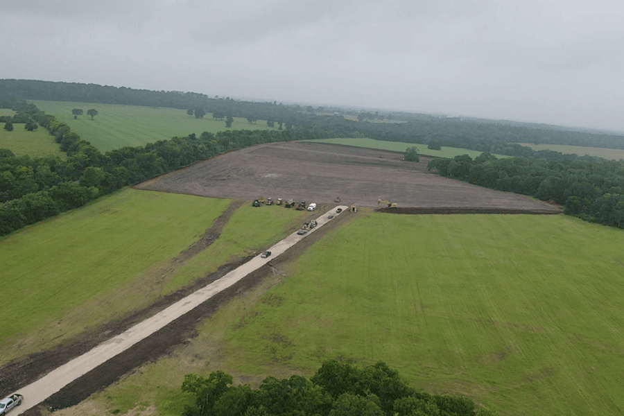 aerial photo of land cleared for elementary school