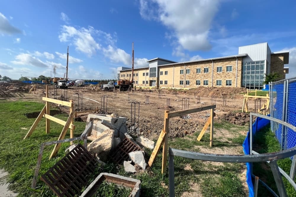 exterior of high school with construction
