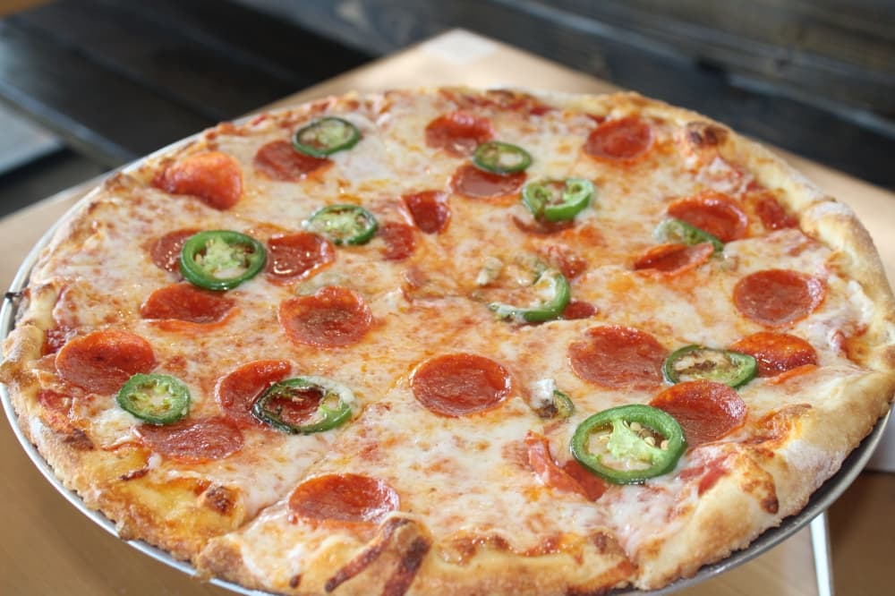 Pepperoni and jalapeno pizza.