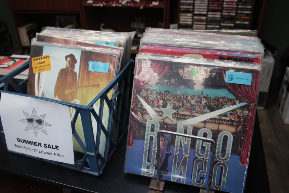 Boxes of records for sale. 