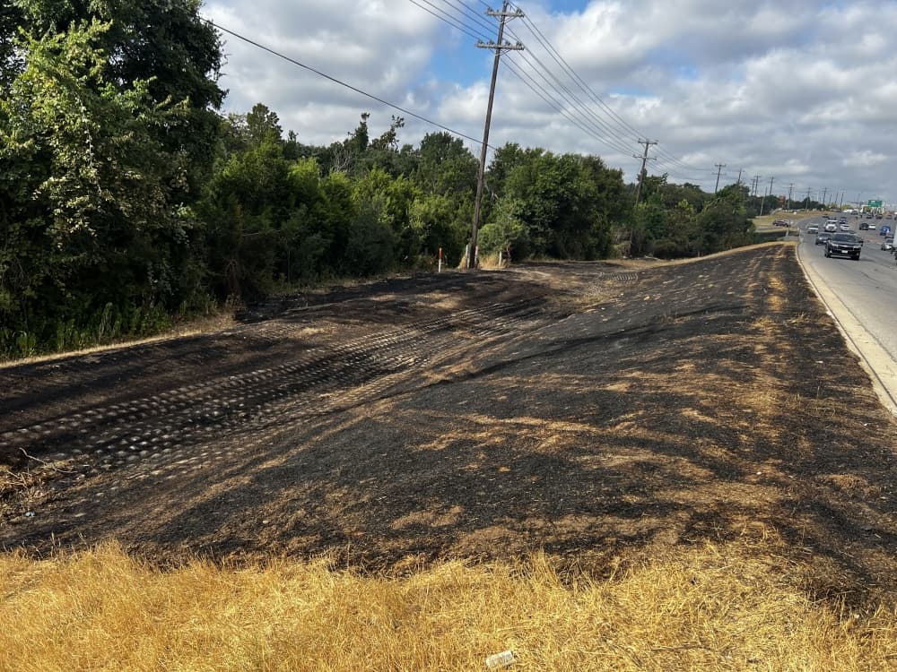 The 50-acre brush fire was 60% contained as of 3:30 p.m. Aug. 9. (Grace Dickens/Community Impact)