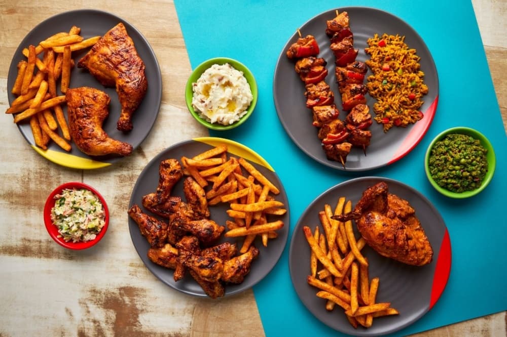 This image shows chicken and sides from Nando's South African restaurant.