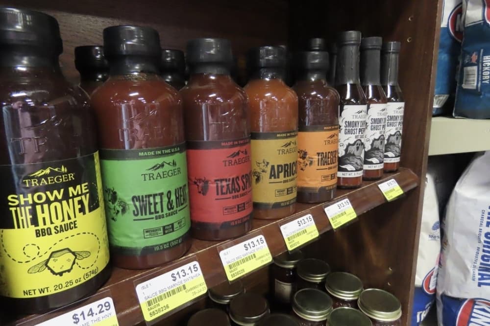 Line of barbecue sauces sits on shelf at Argyle Feed and Hardware. 