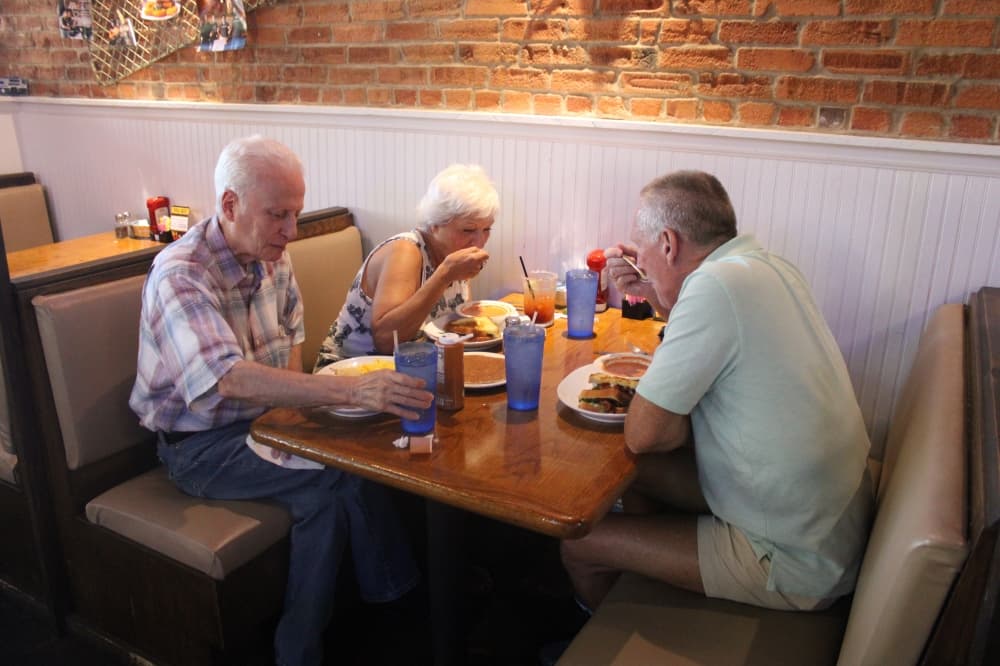 Lucy's on the Square diners enjoy a meal.