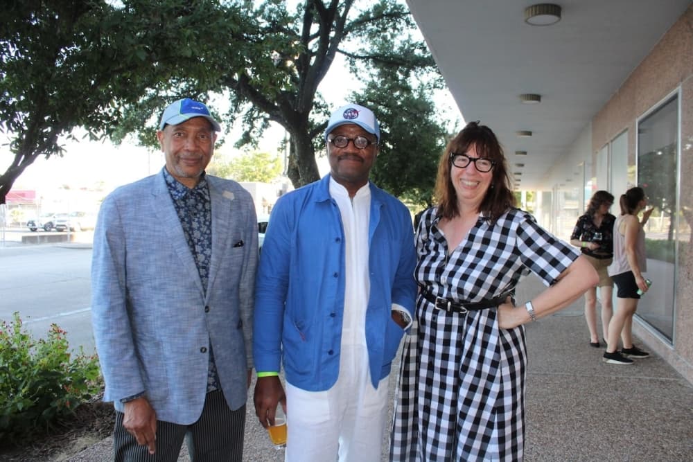 Christopher Blay speaks with officials from the local Houston museum district. 