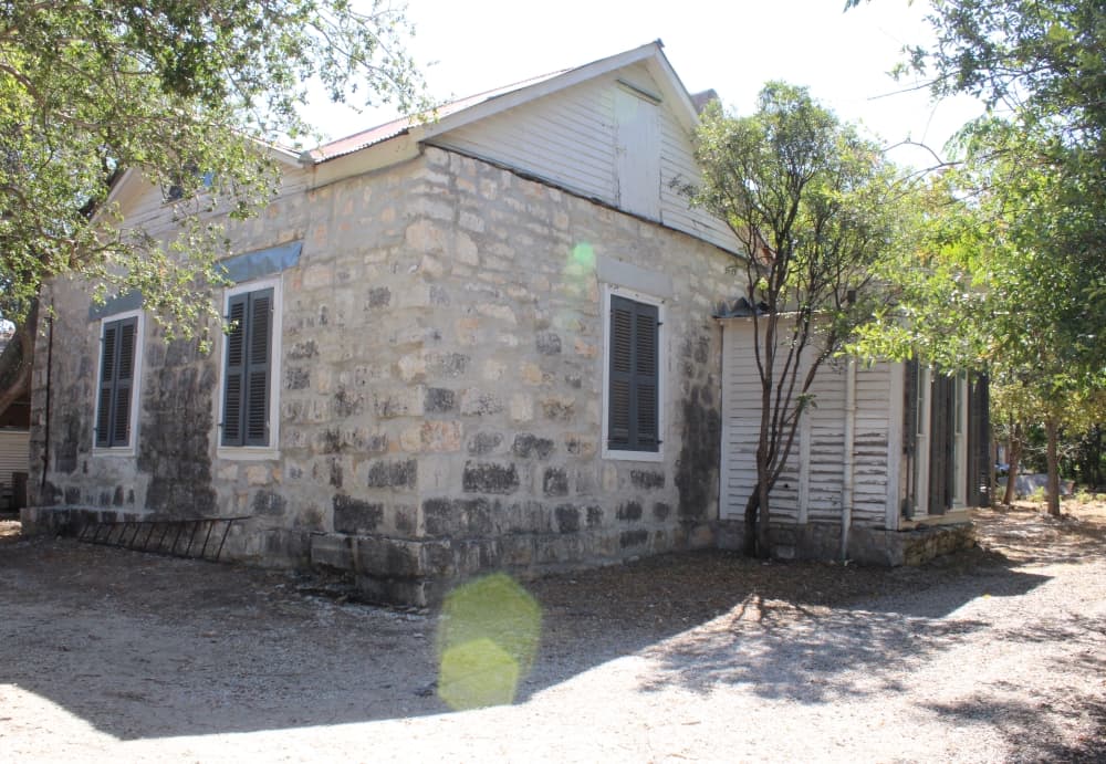 The original exterior is exposed on the southwest corner of the home.