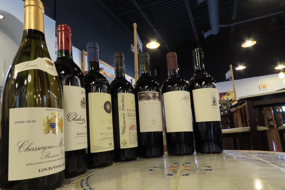 Sample bottles of exotic wines from around the world at Corner Wines & Wine Bar in Plano