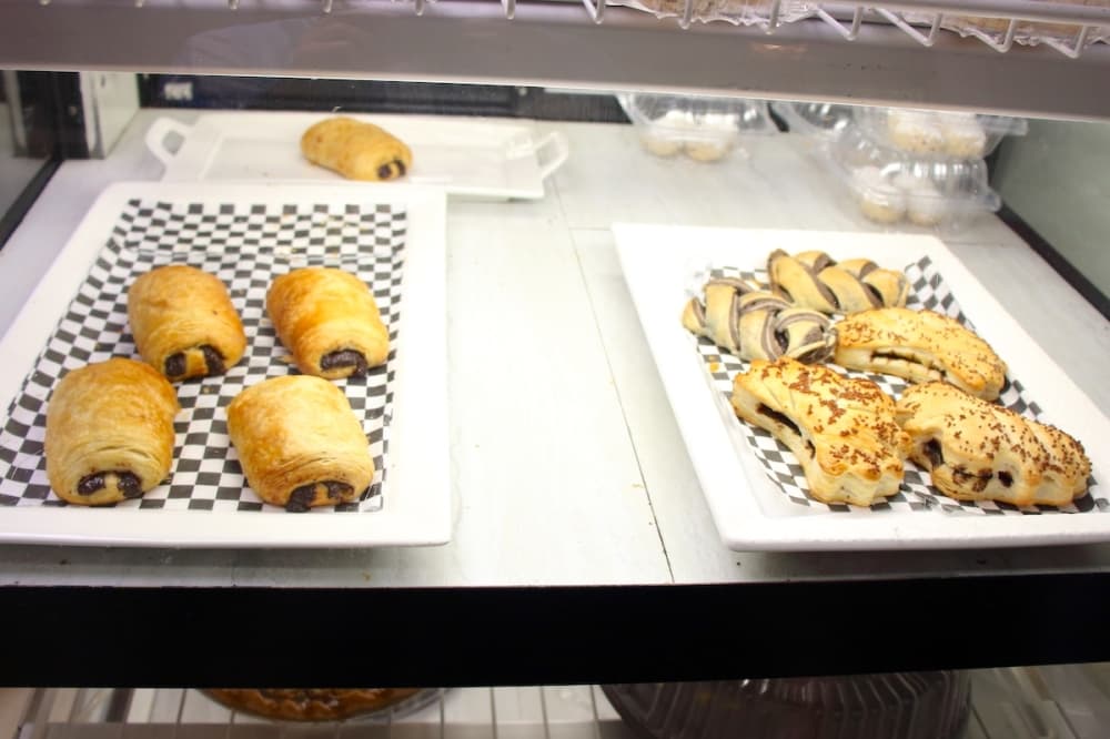 display case with a variety of French pastries