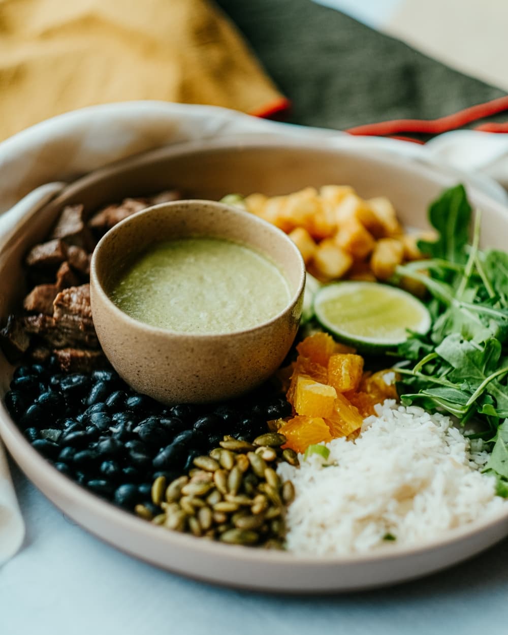 A summer siete seasonal bowl is photographed on a table.