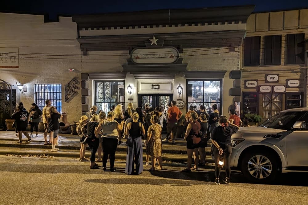 A photo of people on a ghost tour in Old Town Spring